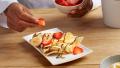Banana cooked crepes with Nutella® and nuts