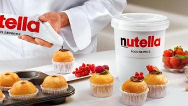 Nutella piping bag on cupcake