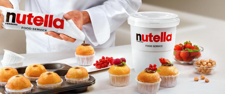 Nutella piping bag on cupcake