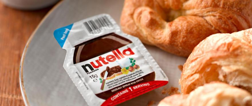 Nutella bag next to croissant