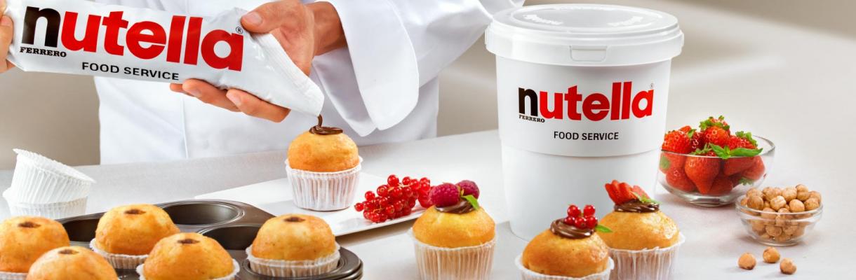 Nutella piping bag on cupcake