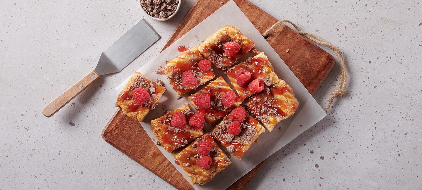 Raspberry Caramel Blondie Bars made with Crunch®
